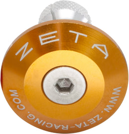 ZETA Gold Bar End Plug for bicycle handlebars, showcasing a sleek, shiny finish and precise fit for enhanced bike aesthetics.