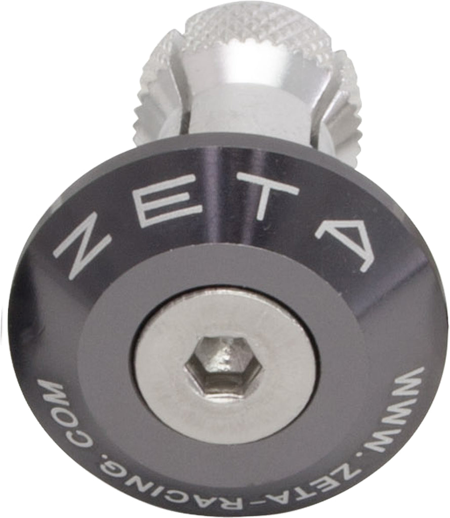 ZETA titanium bar end plug for bicycle handlebars, featuring a sleek, durable design for secure fit and style.