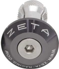 ZETA titanium bar end plug for bicycle handlebars, featuring a sleek, durable design for secure fit and style.